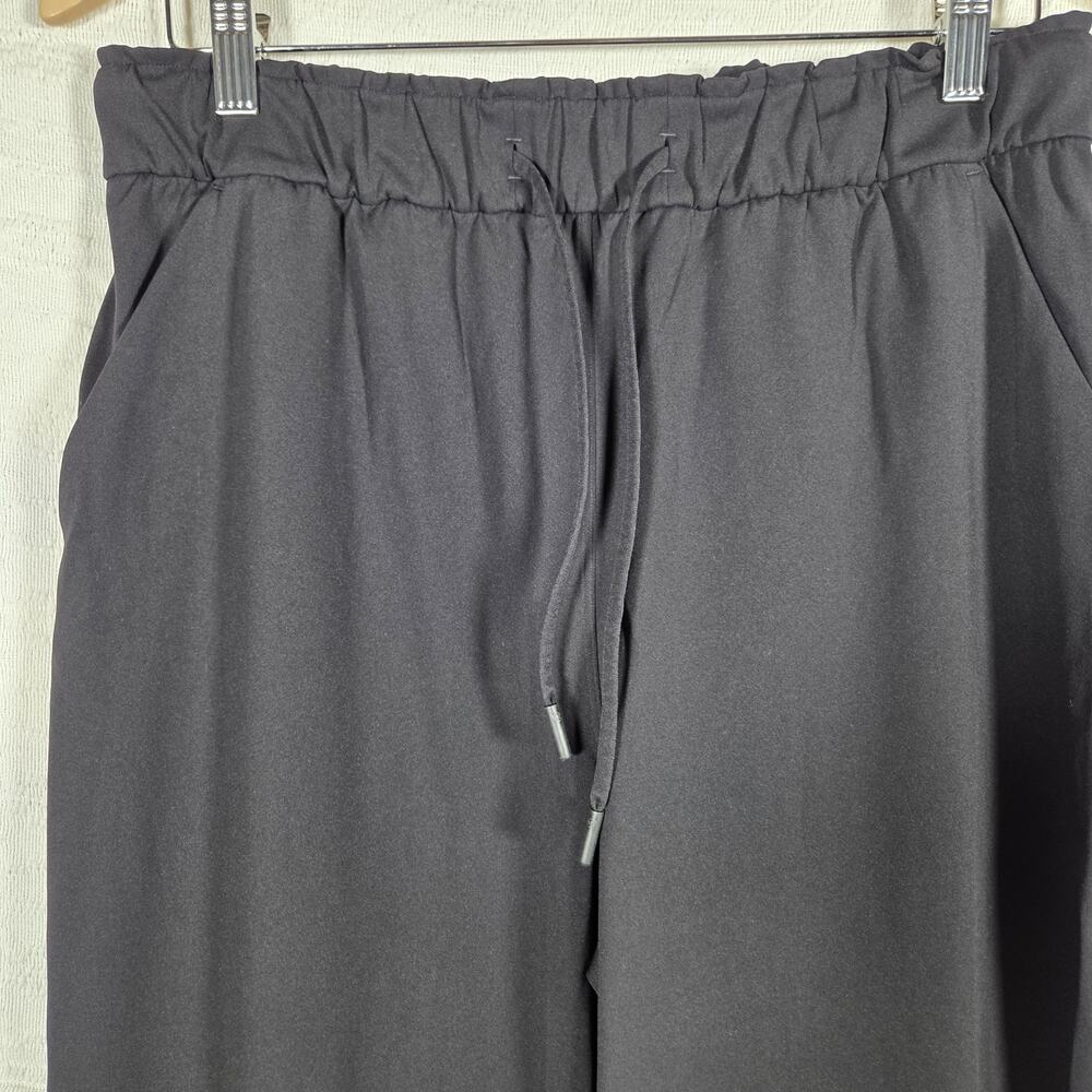 Lululemon Pants Women Size 10 Black Drawstring Athletic Travel Lounge‎ Stretch - Picture 2 of 8